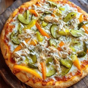 - 1 pre-made pizza crust - 1 cup cooked chicken, shredded - 1/2 cup dill pickles, sliced The base of this pizza is a pre-made pizza crust. You can buy one from the store or make your own. Next, you need cooked chicken. I love using shredded rotisserie chicken for its flavor and convenience. Finally, dill pickles are a must. Their tangy taste adds a unique twist to the pizza. - 1/2 cup ranch dressing - 1 cup mozzarella cheese, shredded - 1/2 cup bell peppers, sliced - 1/4 cup red onion, thinly sliced Ranch dressing acts as the sauce. It gives the pizza a creamy and zesty kick. Mozzarella cheese is essential for that melty goodness. Bell peppers and red onion add color and crunch, making every bite exciting. - Choosing quality chicken - Selecting fresh vegetables - Finding the best ranch dressing When buying chicken, look for fresh, organic options if possible. They taste better and are healthier. For veggies, choose bright, firm bell peppers and onions. They should feel heavy for their size. Lastly, find a ranch dressing that you love. Homemade is great, but there are many tasty store brands too. For the full recipe, check out the details in the section above. 1. Preheat your oven to 425°F (220°C). This step is key for a crispy crust. 2. On a floured surface, roll out the pizza crust. Aim for your favorite thickness. 3. Carefully place it on a pizza stone or a baking sheet lined with parchment paper. 1. In a medium bowl, mix ranch dressing with garlic powder, salt, and pepper. Stir well until combined. 2. Using a spatula, spread this ranch mixture evenly on the crust. Leave a half-inch border at the edges. 1. Layer shredded chicken on top of the ranch dressing. This gives each bite great flavor. 2. Add sliced dill pickles, bell peppers, and red onion evenly over the chicken. This adds color and crunch. 3. Sprinkle shredded mozzarella cheese generously over the top. Finish with a light dusting of dried dill for added flavor. Now, you’re ready to bake your masterpiece! To bake your pizza just right, preheat your oven to 425°F (220°C). This high heat helps create a golden crust. Bake the pizza for 12 to 15 minutes. Check the cheese; it should be melted and bubbly, while the crust turns a nice brown. To ensure a crispy crust, roll out your pizza dough evenly. A thicker dough may not crisp well. Also, avoid adding too many wet toppings; they can make the crust soggy. You can add more toppings to boost flavor. Try sliced olives or cooked bacon for a savory kick. For a spicy touch, add jalapeños or red pepper flakes. Using different types of cheese can elevate your pizza. Cheddar or pepper jack cheese can add a nice twist. Mixing cheeses gives a rich depth of flavor, making each bite exciting. For sides, a fresh green salad pairs well with the pizza. The crunch of lettuce and veggies balances the rich flavors of the pizza. You might also serve carrot sticks or celery with ranch dressing for dipping. For presentation, cut the pizza into wedges and serve it on a rustic wooden board. Garnish with extra dill pickle slices on the side. This adds color and makes the dish look appetizing. Enjoy your meal! For the complete preparation, check the [Full Recipe]. {{image_4}} If you want a gluten-free pizza, you can use gluten-free pizza crusts. Many stores sell them, or you can make your own. They taste great with Pickle Ranch Chicken and Veggie Pizza. Just check the label to ensure it meets your needs. For a healthier twist, consider using lighter ranch dressing. You can find yogurt-based ranch options. These taste good and cut down on calories. You can also mix in some Greek yogurt for extra creaminess without extra fat. You can switch up the protein in this pizza. Instead of chicken, try turkey or even tofu. These options give a different taste and can fit different diets. When it comes to veggies, the sky is the limit! Add spinach for a fresh touch or mushrooms for umami. You can also toss in zucchini or cherry tomatoes. Each veggie adds a unique flavor and texture to your pizza. Using seasonal ingredients can make your pizza extra special. In summer, add corn or fresh basil for a sweet twist. These bright flavors will make your pizza taste like sunshine. During the holidays, think about toppings like cranberries or roasted squash. These flavors can remind you of festive meals. Plus, they add a fun spin to the classic recipe. For more ideas and details, check out the Full Recipe. Enjoy exploring these delicious variations! To keep your leftover pizza fresh, place it in the fridge. Use an airtight container or wrap it tightly in plastic wrap. This helps keep moisture in and prevents it from drying out. If you have several slices, stack them with parchment paper in between. This keeps the toppings intact and makes it easy to grab a slice later. When you want to enjoy your pizza again, the best method is using an oven. Preheat your oven to 375°F (190°C). Place the pizza on a baking sheet. Heat for about 10-15 minutes until the cheese melts again. This method helps keep the crust crispy. You can also use a skillet on the stove. Heat it on low and cover it for a few minutes. This gives a nice crispy crust without burning. If you need to freeze your pizza, start by letting it cool completely. Cut it into slices. Wrap each slice in plastic wrap. Then place the wrapped slices in a freezer bag. Squeeze out as much air as possible to prevent freezer burn. When you're ready to eat, take a slice out and thaw it in the fridge overnight. To reheat, use the oven method mentioned above. Enjoy your Pickle Ranch Chicken and Veggie Pizza later from the freezer! You can find the full recipe above. Making Pickle Ranch Chicken and Veggie Pizza takes about 25 minutes. You’ll spend 10 minutes prepping the ingredients. Then, the pizza bakes for 12 to 15 minutes. This quick time makes it perfect for busy nights. Yes, you can use leftover chicken! Shredded rotisserie chicken works great here. It saves time and adds flavor. Just make sure to warm it up a bit before adding it to the pizza. This way, it blends well with the ranch and cheese. To go with this pizza, try a fresh salad. A simple side salad with greens and tomatoes adds a nice crunch. You might also enjoy veggie sticks with ranch dip. These sides keep the meal light and fun! Pickle Ranch Chicken and Veggie Pizza combines great flavors and textures. We discussed key ingredients, like pre-made crust, chicken, and dill pickles. I shared tips for selecting fresh items and preparing your pizza. Remember to play with toppings for a personal touch. You can customize this dish for any season. Store leftovers properly and follow reheating tips to keep them tasty. Enjoy making this fun pizza and impress your family or friends!