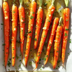 To make honey garlic butter roasted carrots, you will need the following ingredients: - 1 lb (450 g) baby carrots (or regular carrots, peeled and cut into 1-inch pieces) - 3 tablespoons unsalted butter - 2 tablespoons honey - 4 cloves garlic, minced finely - 1 teaspoon fresh thyme leaves (or ½ teaspoon dried thyme) - Salt and freshly ground black pepper to taste - Fresh parsley, chopped for garnish (optional but recommended) You will find these tools helpful for your cooking: - Oven - Baking sheet - Parchment paper - Small saucepan - Mixing bowl - Stirring spoon - Knife and cutting board If you need to make changes, here are some options: - Instead of baby carrots, use regular carrots. Just peel and cut them. - You can swap unsalted butter with olive oil for a dairy-free option. - Maple syrup can replace honey for a different sweet taste. - If you don't have fresh thyme, use dried thyme or omit it. These ingredients and tools will help you create a dish that is simple, tasty, and full of flavor. Enjoy the process! Start by prepping your oven. Preheat it to 400°F (200°C). This helps the carrots roast well. Next, gather your ingredients. You will need baby carrots, unsalted butter, honey, garlic, thyme, salt, and pepper. If you don’t have baby carrots, use regular ones. Just peel and cut them into 1-inch pieces. Now, melt the butter in a small saucepan over medium heat. Watch it closely as it starts to bubble. Once melted, add the minced garlic and honey. Stir this mix well. Let it cook for about one minute, stirring often. This keeps the garlic from burning. After a minute, take the pan off the heat. Add fresh thyme, salt, and pepper. Mix everything together to spread the flavors evenly. In a large mixing bowl, place your coated carrots. Pour the honey garlic butter over them. Toss the carrots until they are fully covered. This step ensures that every bite is flavorful. Next, prepare a baking sheet by lining it with parchment paper. This makes for easy cleanup later. Spread the carrots out in a single layer. This allows them to roast evenly. Now, place the baking sheet in your hot oven. Roast the carrots for 25-30 minutes. Halfway through, take them out and gently toss them. This helps them caramelize and cook evenly. You want them tender and golden brown. Once the time is up, remove the baking sheet from the oven. Let the carrots cool for a few minutes. This helps them hold their shape. For a fresh touch, chop some parsley. Sprinkle it on top of the carrots just before serving. This adds color and flavor. Enjoy your tasty honey garlic butter roasted carrots! To roast carrots well, start with fresh ones. Baby carrots are great, but you can use regular ones. Just peel and cut them into 1-inch pieces. Uniform size helps them cook evenly. Preheat your oven to 400°F (200°C). This heat is key for a good roast. Line your baking sheet with parchment paper. It makes cleanup easier and helps the carrots roast better. Caramelization gives carrots a sweet, rich flavor. To get this, coat the carrots in honey garlic butter well. Spread them in a single layer on the sheet. If they crowd each other, they won't brown well. Toss them halfway through roasting. This helps them brown evenly. Look for a golden color and a tender texture. The outside should be slightly crispy, while the inside stays soft. You can change the flavor of your carrots easily. Add spices like chili flakes for heat or lemon zest for brightness. Consider using maple syrup instead of honey for a different sweetness. Fresh herbs like rosemary or dill can also work well. If you want a nutty flavor, sprinkle some toasted nuts on top before serving. Each twist can make your dish unique and tasty! {{image_4}} You can change the carrots for other veggies. Try parsnips for a sweet twist. Brussels sprouts add a nice crunch. Sweet potatoes bring a hearty flavor. Broccoli or cauliflower can work too. Just cut them to a similar size for even cooking. You can make these carrots spicy. Add a pinch of red pepper flakes for heat. Want a sweeter taste? Use maple syrup instead of honey. You can also add citrus zest for brightness. Try lemon or orange to lift the flavors. Making this dish vegan is easy. Swap butter for coconut oil or vegan butter. Use agave syrup instead of honey for sweetness. This keeps it plant-based and still tasty. For a gluten-free version, this recipe is already safe. Enjoy it without any changes if you need gluten-free meals. To keep your leftover honey garlic butter roasted carrots fresh, let them cool first. Once they are cool, place them in an airtight container. Make sure to store them in the fridge. They stay good for about 3 to 5 days. If you want to keep them longer, freezing is a great option. When you're ready to enjoy the carrots again, you can reheat them easily. The oven works best. Preheat your oven to 350°F (175°C). Spread the carrots on a baking sheet and warm them for about 10-15 minutes. This keeps them tasty and maintains their texture. You can also use a microwave. Just warm them in short bursts of 30 seconds until they are hot. If you want to freeze your leftover carrots, place them in a freezer-safe bag or container. They can last up to 3 months in the freezer. When you're ready to eat them, thaw them in the fridge overnight. Then, reheat them as mentioned above. This way, you can enjoy this delicious dish even later! You can serve these carrots as a side dish with many meals. They pair well with roasted chicken, grilled steak, or baked fish. You can also enjoy them with quinoa or rice for a tasty vegetarian meal. Adding them to a holiday feast makes a colorful, sweet addition. Roast the carrots for 25-30 minutes at 400°F (200°C). Halfway through, toss them gently. This helps them cook evenly. You want them tender but not mushy. Check for doneness by piercing a carrot with a fork. If it goes in easily, they are ready! Yes, you can prepare these carrots in advance. You can mix the honey garlic butter and coat the carrots a few hours ahead. Just store them in the fridge. When you are ready to roast, take them out and let them sit at room temperature for about 15 minutes before cooking. This helps them roast evenly. Roasting carrots is simple and delicious. I’ve shared the best ingredients, tools, and methods to make it easy. You can try different flavors and even use other veggies. Storing leftovers is simple, too. Remember, you can always adjust to fit your diet. Cooking can be fun and tasty with these tips. Enjoy your time in the kitchen and the great meals you create!