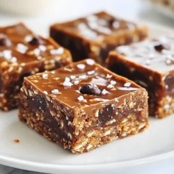 To make delicious Chocolate Coconut Energy Bars, you need simple and healthy ingredients. Here’s what you’ll need: - 1 cup rolled oats - 1/2 cup unsweetened shredded coconut - 1/2 cup almond butter (or any nut butter of your choice) - 1/4 cup honey or maple syrup - 1/2 cup dark chocolate chips - 1/4 teaspoon sea salt - 1/2 teaspoon vanilla extract - 1 tablespoon chia seeds (optional for added nutrition) These ingredients are easy to find at your local store. You can mix and match nut butters and sweeteners based on your taste. Almond butter gives a nice flavor, but peanut butter works too. Honey adds a touch of sweetness, while maple syrup makes it vegan-friendly. Shredded coconut adds a chewy texture, making these bars even more enjoyable. Dark chocolate chips bring a rich taste that pairs well with the coconut. Using sea salt balances the sweetness and enhances the flavors. If you want a boost of nutrition, add chia seeds. They are tiny but packed with fiber and omega-3s. This recipe is flexible, so feel free to adjust ingredients to fit your needs. {{ingredient_image_2}} 1. Mixing dry ingredients Start with a large bowl. Add 1 cup of rolled oats, 1/2 cup of shredded coconut, and optional chia seeds. Mix them with a spoon until they are evenly combined. 2. Melting and combining wet ingredients In a small saucepan, add 1/2 cup of almond butter and 1/4 cup of honey or maple syrup. Set the heat to low. Stir the mixture until it melts and blends well. Once melted, remove it from heat and add 1/2 teaspoon of vanilla extract. 3. Incorporating dry ingredients with wet mixture Pour the warm almond butter mix over the dry ingredients in the bowl. Use a spatula to combine everything well. Make sure all the dry ingredients get coated. 4. Folding in chocolate chips and salt Gently fold in 1/2 cup of dark chocolate chips. Sprinkle in 1/4 teaspoon of sea salt. Stir until the chocolate chips are evenly distributed. 5. Preparing the baking dish Line an 8x8 inch baking dish with parchment paper. Leave some paper hanging over the edges. This will help you lift out the bars later. 6. Pressing mixture into the dish Transfer the mixture to the lined baking dish. Press it down firmly with a spatula or your hands. This helps the bars hold their shape. 7. Setting in the refrigerator Place the dish in the refrigerator. Let it chill for at least 1 hour. This makes the bars firm and easier to cut. 8. Cutting the energy bars Once firm, lift the bars out using the parchment overhang. Place them on a cutting board. Cut into squares or bars, based on your liking. Now you have delicious Chocolate Coconut Energy Bars ready to enjoy! To make the best Chocolate Coconut Energy Bars, mixing is key. Make sure to mix the dry ingredients well. This ensures each bite has a balanced flavor. When you pour the warm almond butter mixture over the dry mix, use a spatula to combine everything. This helps coat the oats and coconut evenly. Pressing the mixture down firmly is important too. After spreading the mix in the baking dish, use your hands or a spatula. Press hard so the bars hold their shape. An even surface makes cutting easier later on. Refrigeration time cannot be skipped. Let your bars chill for at least one hour. This helps them firm up. If you skip this step, the bars will crumble when you cut them. For serving, presentation matters. Place the bars on a wooden board for a rustic look. You can sprinkle extra shredded coconut or a few dark chocolate chips on top. This adds a nice touch. If you want to gift the bars, wrap each one in parchment paper. Use twine to tie them up. This makes a lovely and thoughtful gift for friends or family. Pro Tips Chill for Better Texture: Allow the energy bars to set in the refrigerator for at least an hour. This helps them firm up, making them easier to cut and giving them a better texture. Customizable Add-Ins: Feel free to mix in your favorite nuts, seeds, or dried fruits to customize the flavor and nutrition of your energy bars. Easy Cleanup: Use parchment paper to line your baking dish. This not only prevents sticking but also makes cleanup a breeze! Perfect Portioning: For even bars, use a sharp knife and cut while the mixture is still slightly warm, as it will be easier to slice. {{image_4}} You can switch up the nut butter in this recipe. Almond butter is great, but you can also use peanut butter or sunflower seed butter. Each type gives a different taste and can change the nutrition too. For sweeteners, honey or maple syrup works well. You can also try agave syrup or stevia. These options let you adjust the sweetness to your liking. Adding dried fruits like cranberries or raisins gives more flavor and a chewy texture. You can mix in a handful for extra taste. Spices can take your bars to the next level. A pinch of cinnamon adds warmth, while cocoa powder deepens the chocolate flavor. Experiment with these to find your perfect mix! To keep your chocolate coconut energy bars fresh, use an airtight container. This prevents air from drying them out. You can store them in the fridge for easy access. If you want them to last longer, freeze them. Just wrap each bar in parchment paper and place them in a freezer-safe bag. This way, they stay fresh for months. These delicious bars stay fresh in the fridge for up to a week. After that, they may lose their taste and texture. Look for signs of spoilage, like a strange smell or discoloration. If you notice these signs, it’s best to toss them out. Always trust your senses when it comes to food safety. Enjoy your snack! Can I use different types of chocolate? Yes, you can use any chocolate you like. Milk chocolate or semi-sweet chocolate works well. If you prefer a richer flavor, try dark chocolate. Each type will change the taste a bit. Are these energy bars gluten-free? Yes, these bars are gluten-free. Just ensure that you use certified gluten-free rolled oats. Most nut butters are also gluten-free, making them safe for those with gluten sensitivities. How can I make these energy bars vegan? To make these bars vegan, simply swap honey for maple syrup. Both work well as sweeteners. Make sure your chocolate chips are dairy-free too. What can I substitute for honey or maple syrup? You can use agave nectar or brown rice syrup. These options will still give you the sweetness you need while keeping the bars sticky. Can I omit the chia seeds? Yes, you can leave out chia seeds if you don’t have them. They add extra nutrition but are not necessary for the recipe. Feel free to skip them if you prefer. These energy bars are simple to make with rolled oats, nut butter, and sweeteners. Mixing the right ingredients gives you tasty results. Remember to press your mixture firmly and refrigerate it well for the best texture. Feel free to explore different flavors and storage options. You can customize these bars for your needs and enjoy them as snacks or gifts. With a bit of practice, you’ll create your ideal energy bar every time.