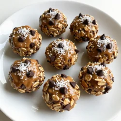 - 1 cup creamy almond butter - 1 cup rolled oats - 1/4 cup honey or maple syrup - 1/4 cup unsweetened shredded coconut - 1/4 cup dark chocolate chips - 1/2 teaspoon pure vanilla extract - A pinch of fine sea salt These ingredients come together to make a delicious treat. The creamy almond butter acts as the base. It gives the bites a rich, nutty flavor. Rolled oats add a hearty texture and help hold everything together. Honey or maple syrup sweetens the mixture. Unsweetened coconut adds chewiness, while dark chocolate chips offer a nice touch of sweetness. Vanilla extract adds depth, and sea salt enhances the flavors. You can get creative with your energy bites! Here are some fun additions: - Chia seeds for added nutrition - Nutmeg or cinnamon for warmth - Dried fruit, like cranberries or raisins, for extra sweetness - Nuts like almonds or walnuts for crunch These options let you customize your bites to your taste. Each choice can bring a new twist to the recipe. - Almond butter: Packed with healthy fats and protein, it helps keep you full. - Rolled oats: A great source of fiber, they aid digestion and provide energy. - Honey or maple syrup: Natural sweeteners that offer quick energy boosts. - Unsweetened shredded coconut: Contains healthy fats and can support heart health. - Dark chocolate chips: Rich in antioxidants, they can improve mood. - Vanilla extract: May have calming effects and enhance flavor without extra sugar. - Sea salt: Balances sweetness and can help with hydration after exercise. Each ingredient adds not just flavor, but also benefits for your body. Enjoy these energy bites as a tasty and healthy snack! {{ingredient_image_2}} To start, grab a large mixing bowl. Add 1 cup of creamy almond butter to the bowl. Next, pour in 1 cup of rolled oats. I like to use old-fashioned oats for a nice texture. Now, add 1/4 cup of honey or grade A maple syrup for sweetness. Then, sprinkle in 1/4 cup of unsweetened shredded coconut. This adds a lovely chewiness. Toss in 1/4 cup of dark chocolate chips. You can choose dairy-free chips if needed. Next, add 1/2 teaspoon of pure vanilla extract and a pinch of fine sea salt. Use a sturdy spatula or spoon to mix everything well. You want a sticky dough that holds together. Once your mixture is ready, wash your hands. Scoop out about 1 tablespoon of the mixture. Roll it into a smooth ball. Keep going until you shape all the mixture into bites. You should get around 12 to 15 bites. Place them on a parchment-lined baking sheet. Ensure they have space to breathe. Now it’s time to chill. Put the baking sheet in the fridge for at least 30 minutes. This helps the bites firm up and hold their shape. After they have chilled, transfer the bites to an airtight container. Store them in the fridge. They will stay fresh for up to one week. Enjoy these tasty bites as a quick snack or a boost before your workout! To mix the ingredients, use a large bowl. Start with creamy almond butter as your base. Next, add rolled oats, honey, and shredded coconut. You want this mix to be sticky. Use a sturdy spatula or spoon to stir well. Make sure all ingredients blend together. For rolling, clean your hands first. This keeps the dough from sticking. Take about one tablespoon of mix and roll it into a ball. One common mistake is not measuring ingredients correctly. This can change the texture. Too much almond butter makes the bites too soft. Not enough oats can make them crumbly. Another mistake is skipping the chilling step. Chilling helps them firm up. If you skip it, the bites may fall apart easily. Also, avoid using too many chocolate chips. They can overwhelm the flavor. To boost flavor, try adding spices like cinnamon or nutmeg. These spices add warmth and depth. You can also mix in a bit of peanut butter for a richer taste. If you like crunch, add chopped nuts or seeds. For a tropical twist, use more shredded coconut. To improve texture, consider using old-fashioned oats. They provide a chewier bite. Enjoy experimenting to find your favorite mix! Pro Tips Storage Tips: Keep the energy bites in an airtight container in the refrigerator to maintain freshness for up to a week. Customization Options: Feel free to mix in your favorite nuts or seeds for added crunch and nutrition. Sweetness Adjustment: If you prefer a sweeter taste, increase the honey or maple syrup slightly to suit your palate. Chocolate Choices: Experiment with different types of chocolate chips, such as white chocolate or nut-free options, for a unique flavor twist. {{image_4}} To make these bites vegan, simply swap honey for maple syrup. This keeps them plant-based. Almond butter is already vegan, so you’re good there. You can enjoy these bites without any animal products. If you need gluten-free snacks, choose certified gluten-free oats. Most rolled oats are safe, but always check the label. The other ingredients, like almond butter and chocolate chips, are naturally gluten-free. You can enjoy these bites without worry. Feel free to get creative with add-ins! You can mix in dried fruits like cranberries, raisins, or apricots. Chopped nuts like walnuts or pecans add crunch and flavor. Just remember to adjust the amount of almond butter if you add a lot of extras. To keep your Almond Butter Energy Bites fresh, use an airtight container. Place them in the fridge right after chilling. They will stay good for about one week. Make sure they are not exposed to air. This keeps them moist and tasty. To extend freshness, layer parchment paper between bites in the container. This prevents them from sticking together. Keep the container in the coldest part of your refrigerator. Avoid the door, as it can be warmer from opening and closing. You can freeze these energy bites for up to three months. First, place them in a single layer on a baking sheet. Freeze them for about two hours. Once frozen, transfer them to a zip-top bag. Label the bag with the date. When you want one, just take it out and let it thaw at room temperature. You can use peanut butter or sunflower seed butter. These options work well. They offer similar textures and flavors. If you have nut allergies, sunflower butter is a great choice. This will keep the recipe safe for everyone. When stored in an airtight container, these bites last about one week. Keep them in the fridge for the best taste. You can also freeze them for up to three months. Just thaw them in the fridge before enjoying. Yes, you can skip sweeteners. Use ripe bananas or dates for natural sweetness. These fruits add flavor and moisture. Adjust your ingredients to keep the same texture, and you will still enjoy tasty bites. Absolutely! These energy bites are perfect for meal prep. You can make a large batch and store them. They are quick snacks for busy days or after workouts. Grab a bite, and you’re ready to go! One energy bite has about 100 calories. It contains healthy fats, fiber, and protein. Each bite offers nutrients from almond butter, oats, and dark chocolate. This makes them a wholesome snack choice. Almond Butter Energy Bites are simple to make and great for snacks. We covered key ingredients and health benefits, plus step-by-step instructions. You learned tips to mix and shape them right, and we explored fun flavor variations. Proper storage keeps them fresh for longer. Remember, feel free to swap ingredients to suit your taste. This recipe offers nutrition and energy in a tasty bite. Enjoy making these healthy treats to fuel your day!