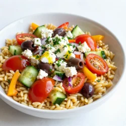 - 1 cup orzo pasta - 1 cup cherry tomatoes, halved - 1 cucumber, diced - 1 bell pepper (red or yellow), diced - ½ red onion, finely chopped - 1 cup Kalamata olives, pitted and halved - ½ cup feta cheese, crumbled - ¼ cup fresh parsley, chopped When you gather these fresh ingredients, you set the stage for a bright and tasty salad. The orzo pasta forms the base, holding onto all the flavors. Cherry tomatoes add sweetness and color. Cucumbers bring a nice crunch, while bell peppers add a hint of sweetness. The red onion offers a bite that contrasts well with the other veggies. Kalamata olives give a briny kick that is just delightful. Finally, feta cheese adds creaminess, and fresh parsley gives a pop of green. - ¼ cup extra-virgin olive oil - 3 tablespoons fresh lemon juice - 1 teaspoon lemon zest - Salt and pepper to taste The pantry ingredients are simple yet vital. Extra-virgin olive oil serves as the heart of the dressing. It adds richness and helps blend the flavors. Fresh lemon juice and lemon zest bring bright acidity, making each bite refreshing. Salt and pepper are essential for enhancing all the tastes in your salad. Use them wisely to make the flavors sing. {{ingredient_image_2}} To start, bring 2 cups of vegetable broth or water to a rolling boil in a medium saucepan. This step is key for cooking the orzo just right. You want to use enough liquid so the pasta cooks evenly. Once it boils, add 1 cup of orzo pasta. Cook it for about 8 to 10 minutes. Check the package for exact times, as it can vary. The orzo should be al dente, which means it has a slight bite. After cooking, drain the pasta in a colander. Rinse it under cold water to stop the cooking. This helps cool it down and keeps it from getting mushy. Set the orzo aside for later. Next, it’s time to chop your fresh veggies. Use a sharp knife for clean cuts. Dice 1 cucumber and chop ½ a red onion finely. Cut 1 cup of cherry tomatoes in half, and dice 1 bell pepper. You can choose red or yellow bell peppers based on your taste. Put all these chopped veggies into a large mixing bowl. Also, add 1 cup of pitted and halved Kalamata olives. Use a spatula or wooden spoon to mix everything well. This helps the flavors blend evenly. Now, let’s make the dressing. In a small bowl, whisk together ¼ cup of extra-virgin olive oil, 3 tablespoons of fresh lemon juice, and 1 teaspoon of lemon zest. This mix brings bright flavors to the salad. Add a generous pinch of salt and pepper to taste. Whisk until the dressing is smooth. If you want, you can adjust the flavors to your liking. Add more lemon juice for tang or more salt for flavor. Once ready, pour the dressing over the orzo and veggie mix. Gently toss everything together to coat. Be careful not to break the feta when you add it later. This simple dressing really elevates the dish! To make a great Greek lemon orzo salad, you need to cook the orzo just right. Cook it al dente. This means it should be firm but not hard. When you cook orzo, follow the package instructions. Usually, it takes about 8-10 minutes in boiling broth or water. After cooking, cool the orzo quickly. Rinse it under cold water right after draining. This stops the cooking process and keeps the pasta from getting mushy. Let the salad sit for a while to allow flavors to blend. I suggest letting it marinate for at least 15 minutes. This simple step makes a big difference. The oil and lemon juice soak into the pasta and veggies, enhancing taste. Adjusting the seasoning is also key. After mixing in the dressing, taste your salad. You can add more salt or pepper if needed. Start with a little and add more as you go. For serving, think about how to make your salad eye-catching. Use a large, colorful platter or individual bowls. This makes it feel special. Garnish with fresh parsley and lemon wedges for a pop of color. This not only looks good but adds a fresh flavor with each bite. A simple touch can elevate your dish and impress your guests. Pro Tips Use Fresh Ingredients: Opt for the freshest vegetables and herbs you can find to enhance the salad's flavor and nutrition. Cook Orzo Perfectly: Ensure the orzo is cooked al dente for the best texture; it should have a slight bite to it. Chill Before Serving: Letting the salad sit for at least 15 minutes or refrigerating it for a couple of hours allows the flavors to meld beautifully. Customize Your Add-Ins: Feel free to add other ingredients like grilled chicken, chickpeas, or artichokes for a heartier salad. {{image_4}} You can change up the vegetables in this salad. Try using zucchini or radishes for a twist. If you want a different cheese, try goat cheese instead of feta. Both options add a unique flavor. For a gluten-free option, look for orzo made from rice or quinoa. These swaps keep the salad fresh and fun. Want to cut down on fat? Use less olive oil and add more lemon juice. You can also skip the cheese or use a low-fat version. If you need a vegan option, leave out the feta. Instead, try using avocado for creaminess. These changes keep it light without losing flavor. Adding protein makes this salad more filling. You can use grilled chicken for a hearty meal. Chickpeas are a great plant-based choice, too. They add texture and nutrients. If you prefer tofu, try marinating it in lemon juice and herbs. Each protein pairs well with the salad's bright flavors. To keep your Greek lemon orzo salad fresh, store it in an airtight container. Make sure the salad cools to room temperature before sealing it up. This helps to prevent condensation, which can make your salad soggy. The salad stays fresh in the fridge for up to three days. If you plan to eat it later, leave the feta cheese and dressing off until serving. This keeps the salad crisp and flavorful. I don’t recommend freezing this salad because the texture of the orzo and vegetables can change. However, if you must freeze it, use a freezer-safe container. Keep in mind that the olives and feta may not taste the same after thawing. If you freeze it, thaw in the fridge overnight. Reheat gently in the microwave, but consider adding fresh herbs and lemon juice to revive the flavor. Can I prepare this salad in advance? Yes, you can make this salad ahead of time. It tastes even better after chilling. Just store it in the fridge for a few hours. The flavors get a chance to mix well. What is the best way to store leftover salad? For storing leftovers, place the salad in an airtight container. Keep it in the fridge. It should stay fresh for about 2-3 days. Is this salad suitable for vegans? This salad is not vegan due to feta cheese. To make it vegan, simply skip the cheese. You can add avocado for creaminess instead. What are the calorie counts per serving? This salad has about 250 calories per serving. This may vary based on the exact ingredients used. How can I substitute orzo? You can use quinoa or rice instead of orzo. Both options offer a different texture but still taste great. Can I use dried herbs instead of fresh parsley? Yes, you can use dried herbs. Use about one-third of the amount called for fresh. Dried herbs are stronger in flavor, so be careful not to overdo it. You learned how to make a fresh and tasty Greek Lemon Orzo Salad. We covered important ingredients like orzo, fresh veggies, olive oil, and spices. I shared step-by-step cooking tips to get the best texture and flavor. Lastly, I provided storage tips and answered common questions. I hope you feel ready to try this healthy salad. Enjoy making it your own—your plate is a blank canvas!